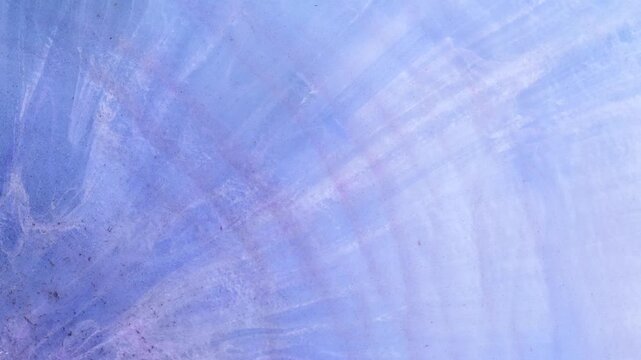 Mixing different colored alcohol inks with epoxy resin in close-up view