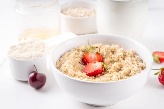 Breakfast oatmeal with adding whey protein, balanced morning food