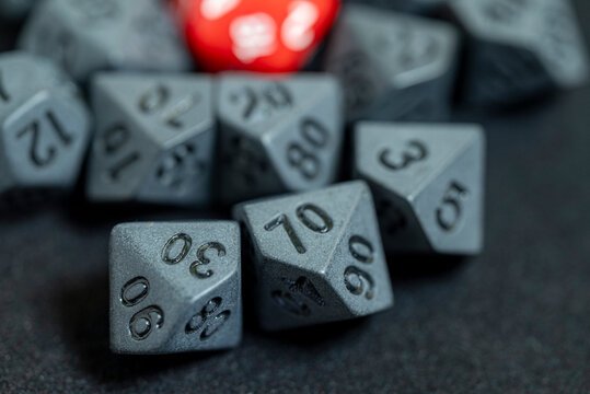 Polyhedral gaming dice on a dark surface The Concept of luck and chance