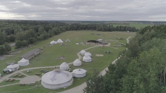Smooth descent toward traditional tents and pens, D-Log