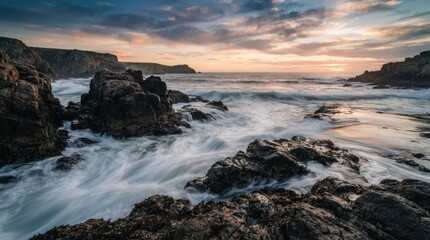 Fototapeta premium Dramatic Rocky Ocean Coast with Powerful Waves and Colorful Sunset Sky