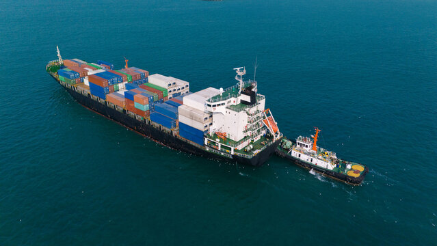 Aerial view from a container drone. Container ships in export-import and logistics business Transporting goods to large ports Worldwide shipping and logistics business International business abroad