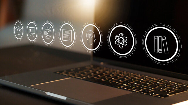 E learning tools on laptop screen with various educational icons and symbols