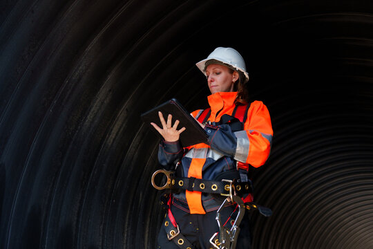 Industrial engineers who inspect large utility pipes inside or in tunnels used for water systems.