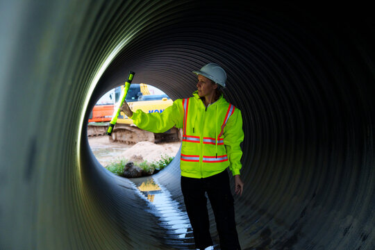 Industrial engineers who inspect large utility pipes inside or in tunnels used for water systems.