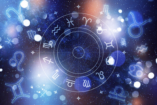 Zodiac signs in a starry sky with symbols and constellations arranged in a circular pattern