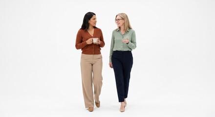 Naklejka premium Two Women Walking and Chatting in Casual Autumn Outfits on White Background