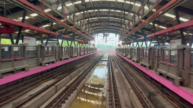 The view from the last coach of a driverless metro train and a video created by reversing the footage.