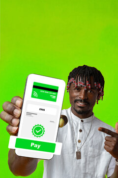 Man shows mobile payment screen with confirmation and amount using green background