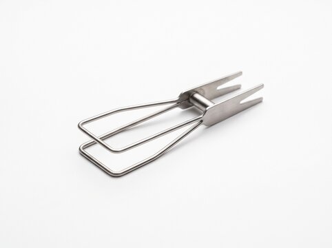 Stainless steel cheese slicer with handle on white background.