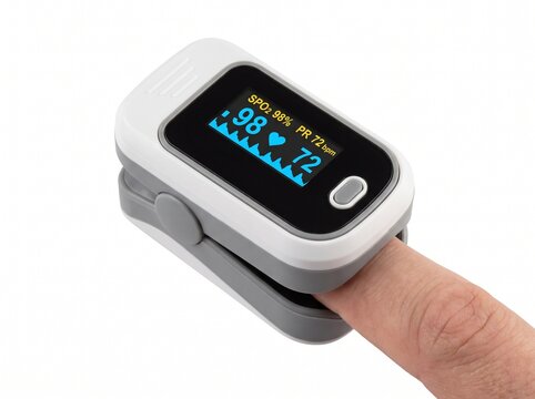 Person using a digital pulse oximeter on their finger.