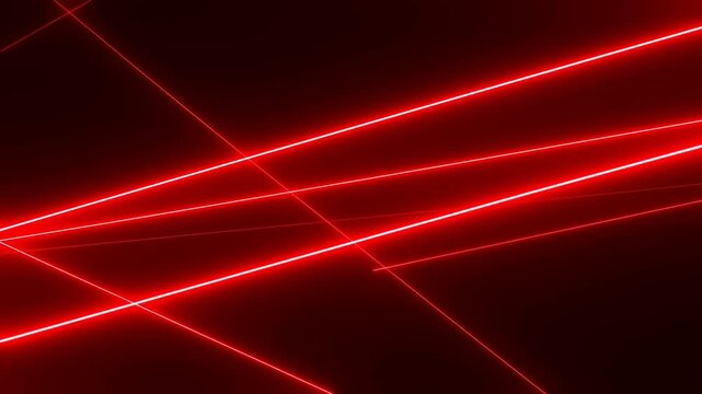 Red laser light lines crossing against dark background with glowing abstract geometry