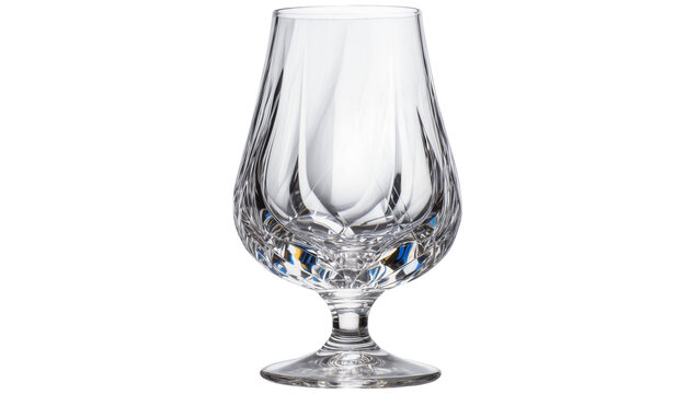 Clear crystal brandy snifter glass with intricate cut patterns, isolated on transparent background