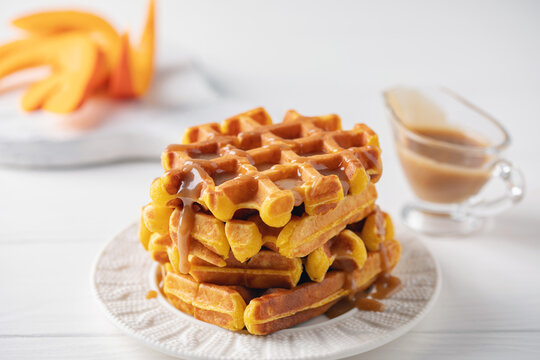 Homemade pumpkin waffles. Autumn recipe. Halloween concept