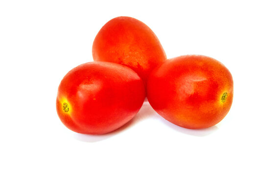 Three Cherry tomatoes isolated on white background