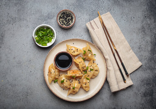 Gyoza dumplings soy sauce chopsticks asian Japanese food wontons