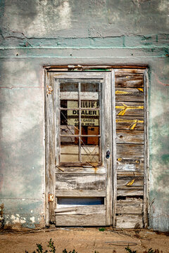 Old wooden door on side of building
