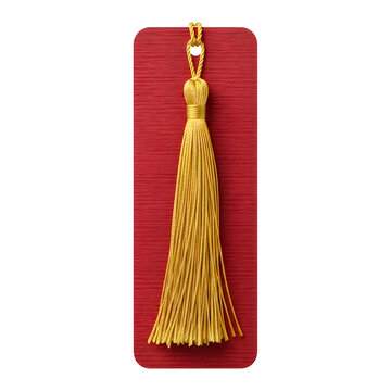 Elegant golden silk tassel hanging on a red bookmark isolated on white background
