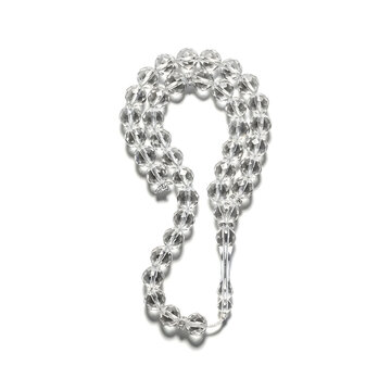 Shiny clear crystal prayer beads isolated on a clean plain white background