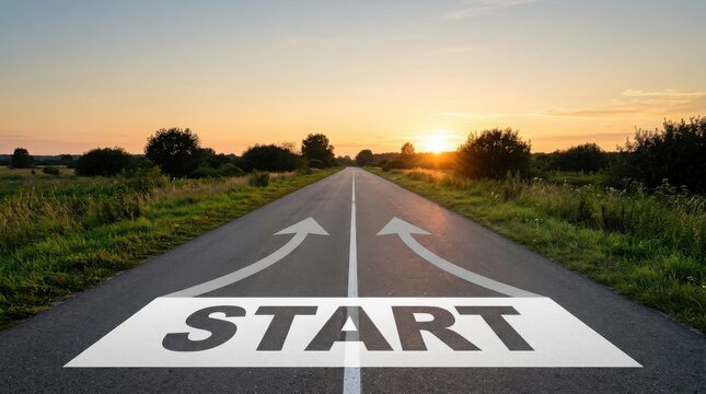 Start word on road with diverging arrows at sunset