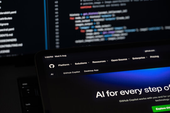 GitHub Ai company web page on program code background