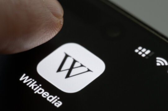 Finger press Wikipedia app icon