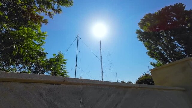 Old Steel Truss Bridge Over a Small Stream Under Clear Blue Sky