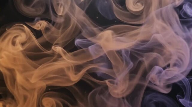 Abstract ink plumes swirling in water create fluid motion on a dark background for use in creative video banners and overlays.