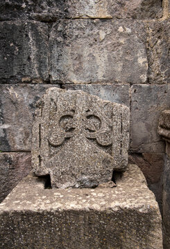 Close-up of medieval Armenian stone cross Khachkar showing detailed relief carving
