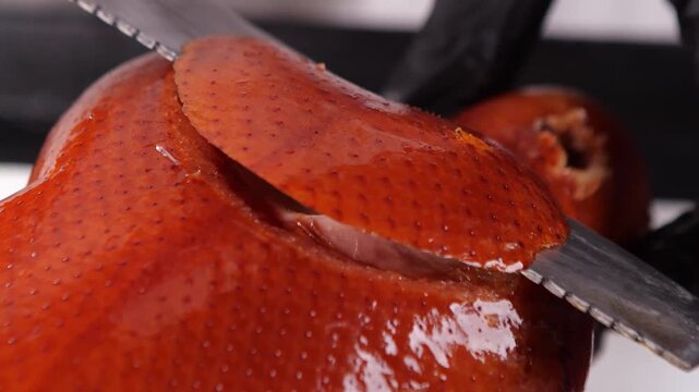 Chef masterfully slicing Peking duck tableside 4K