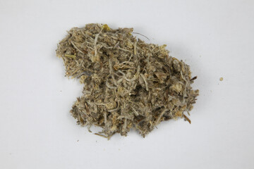 Pile of Dried Herbs Isolated on White Background © LamQuang