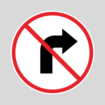No right turn traffic sign with a black directional arrow crossed by a red prohibition symbol.