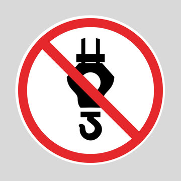 Prohibition sign with an electrical plug symbol indicating no electrical connections or devices allowed.