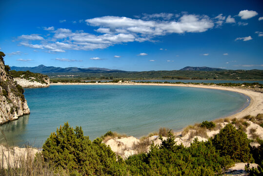 Aerial perspective of the famous horseshoe curved bay of Voidokilia beach in Greece.