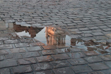 reflection of a church (st nicolas basilica) in a puddle in nantes in france  © frdric