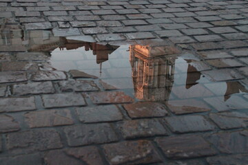 reflection of a church (st nicolas basilica) in a puddle in nantes in france  © frdric