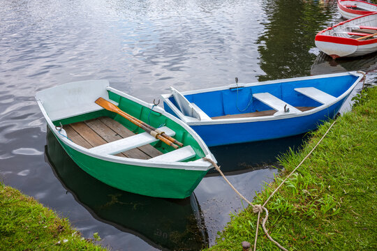 Colourful rowing boats for hire at Thorpeness Meare