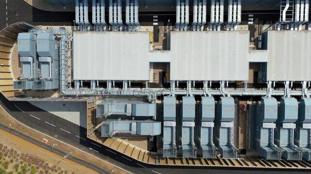 Aerial View of Hyperscale Data Center with Rows of Industrial Chillers and Server Cooling Units in the UK