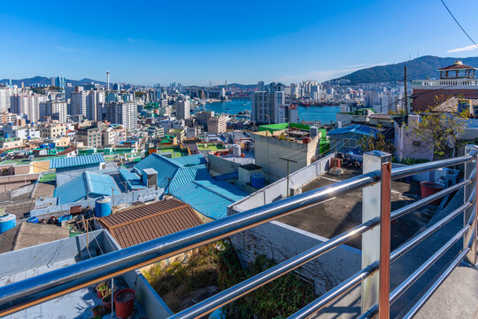 View of city landscape and colourful rooftops and houses of Nambumin-dong District on a sunny day, Seo-gu, Busan, South Korea