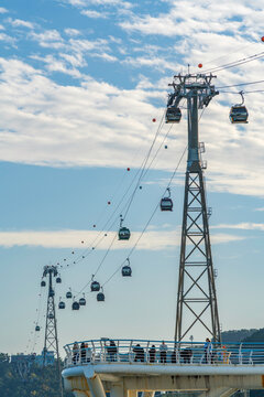 View of Songdo Cloud Trails and Songdo Cable Car in background on a sunny day, Busan, South Korea