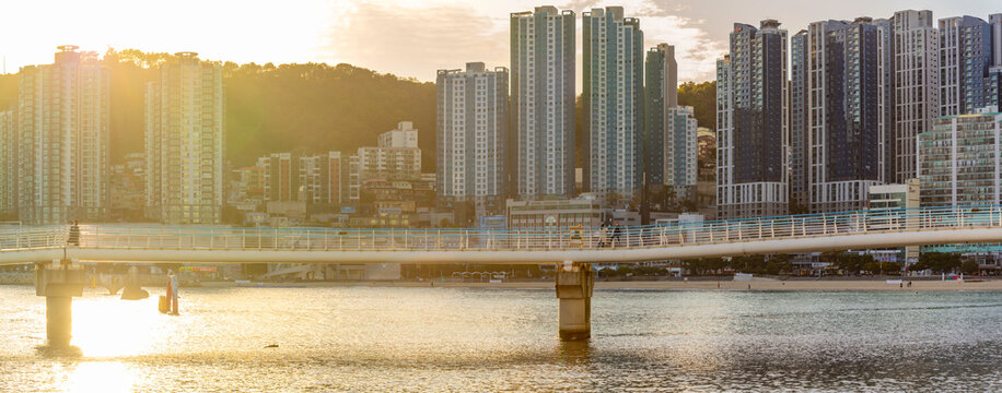 View of Songdo Cloud Trails and high rise buildings in background on a sunny day, Busan, South Korea