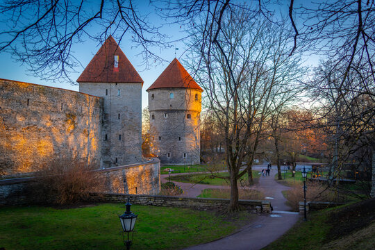 View of old town walls at sunset in winter, Tallinn, Estonia