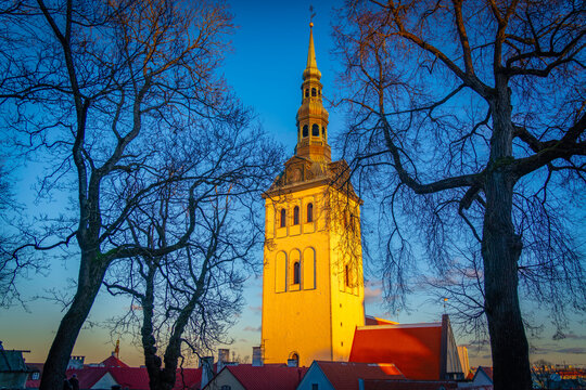 View of St. Nicholas Church & Museum at sunset in winter, Tallinn, Estonia