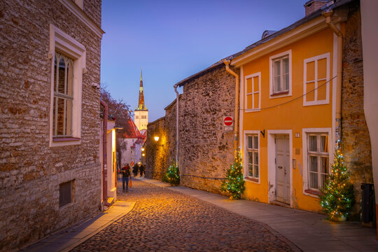 View of St. Nicholas Church & Museum at dusk in winter, Tallinn, Estonia