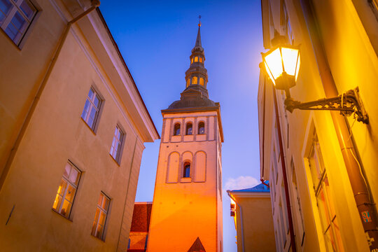 View of St. Nicholas Church & Museum at dusk in winter, Tallinn, Estonia