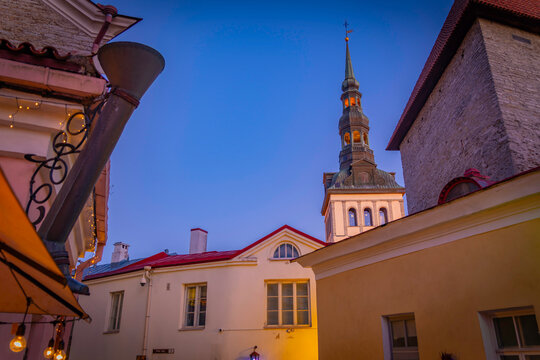 View of St. Nicholas Church & Museum at dusk in winter, Tallinn, Estonia