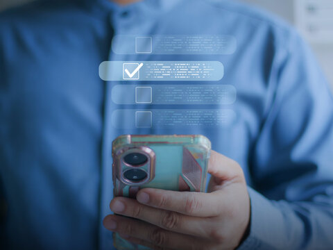 Person using smartphone with glowing HR search icon and digital analytics symbol, representing online recruitment, workforce management and modern HR technology.