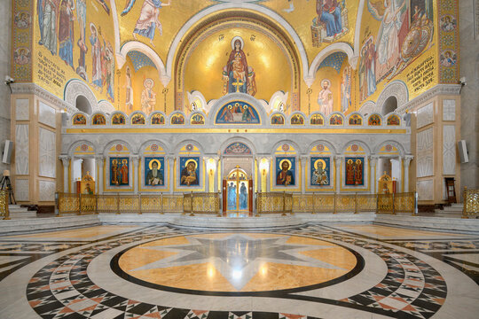 Interior view of Church of Saint Sava with detailed mosaics and icons in Belgrade, Serbia