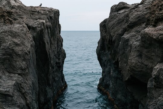 Narrow gap between rock cliffs at Jeju coast