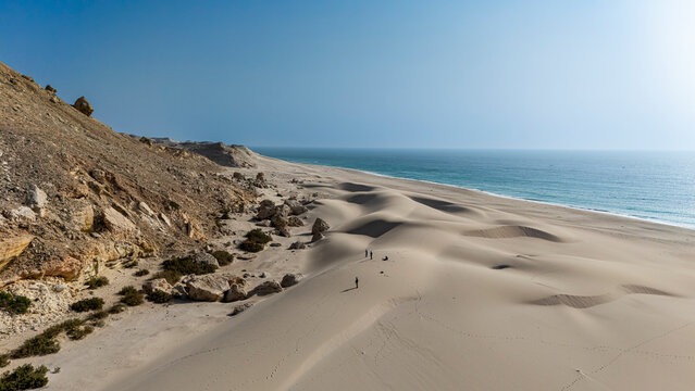 Exploring the expansive sand dunes along the Indian Ocean shoreline in Puntland, a coastal region in Somalia